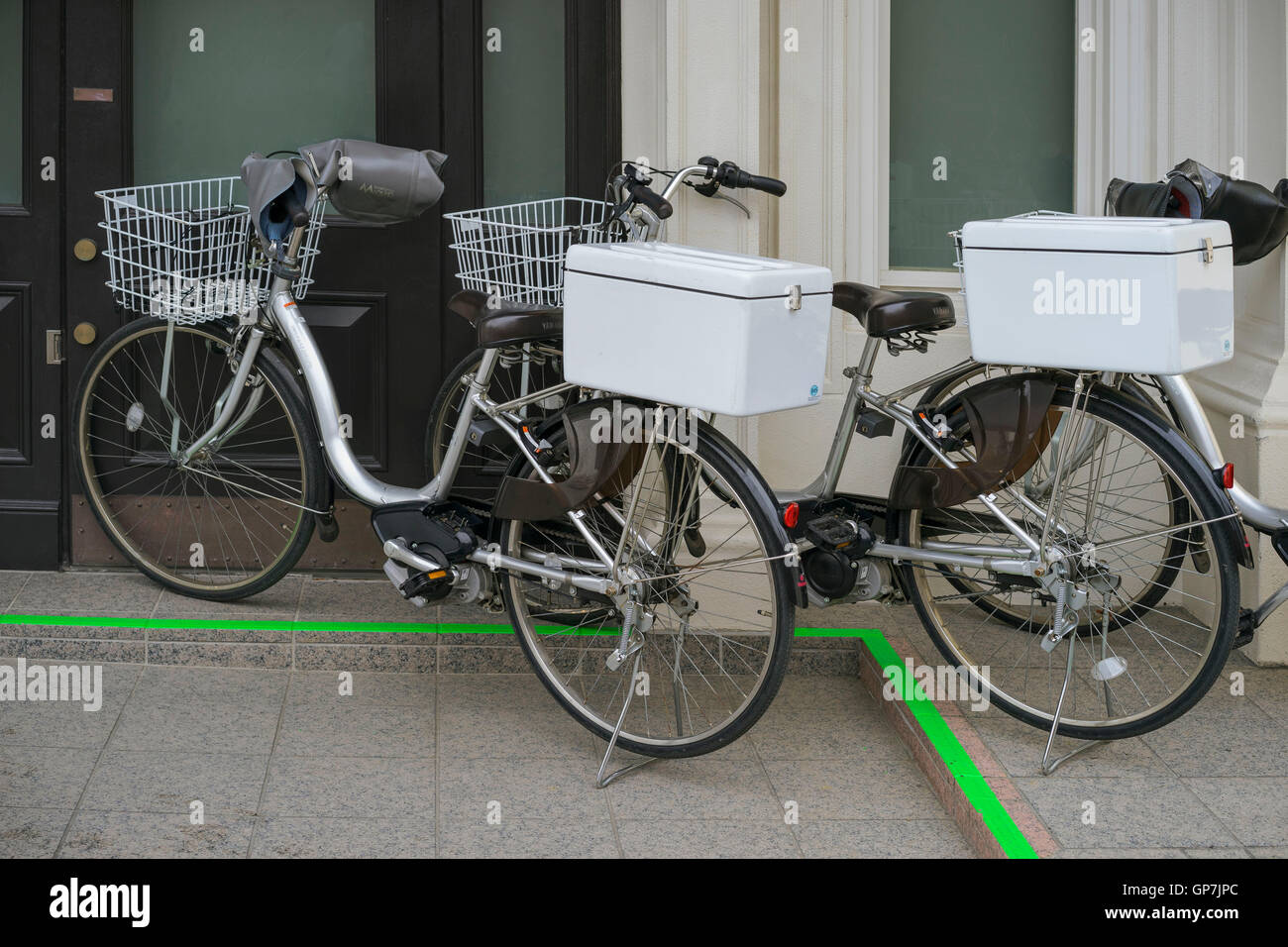 Motorised delivery bicycles, kamakura, japan Stock Photo - Alamy
