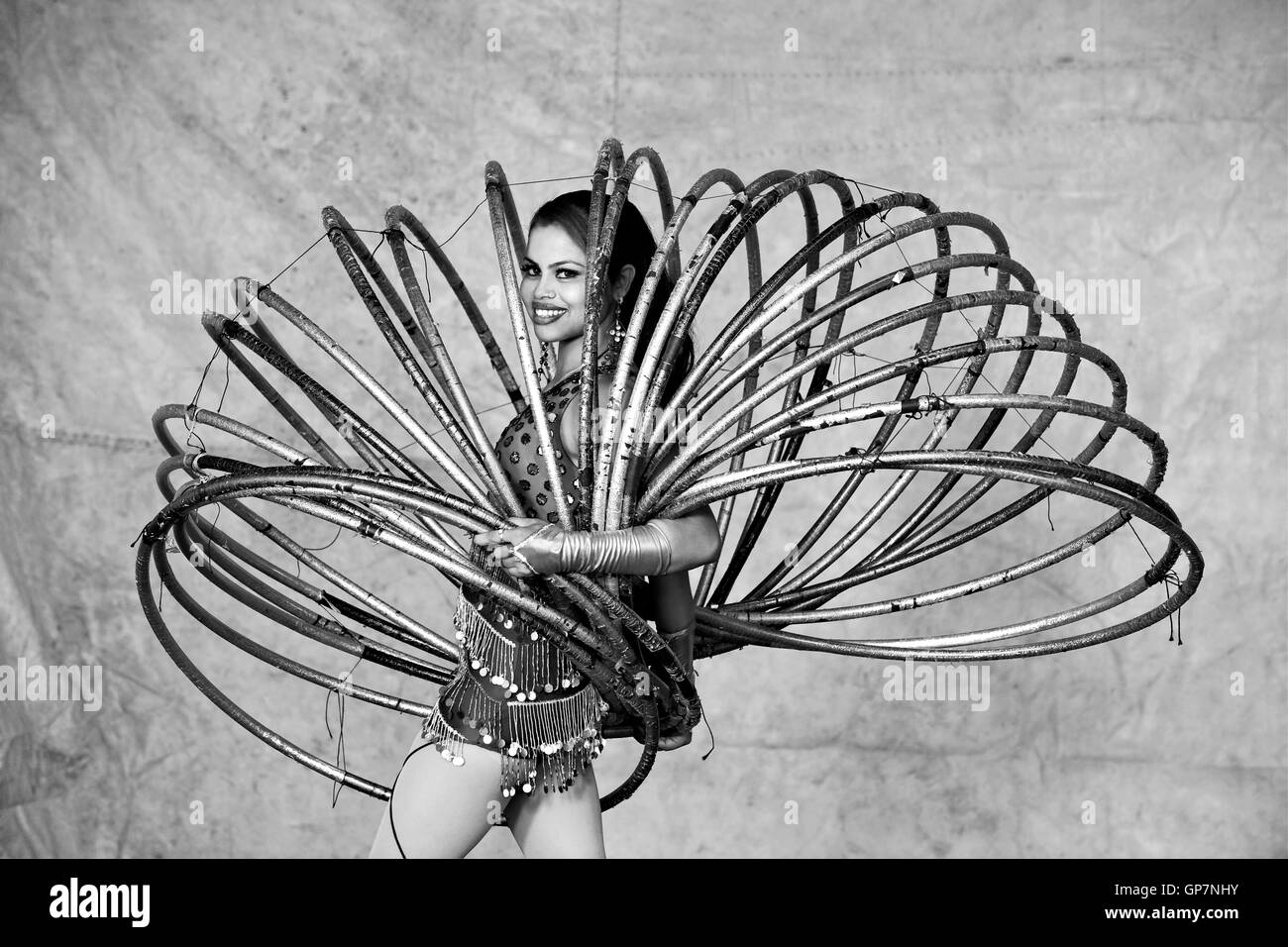 Woman performing hula hoop in circus, india, asia Stock Photo