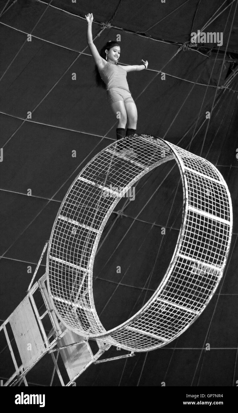 Woman enjoying aerial wheel, acrobatics, india, asia Stock Photo