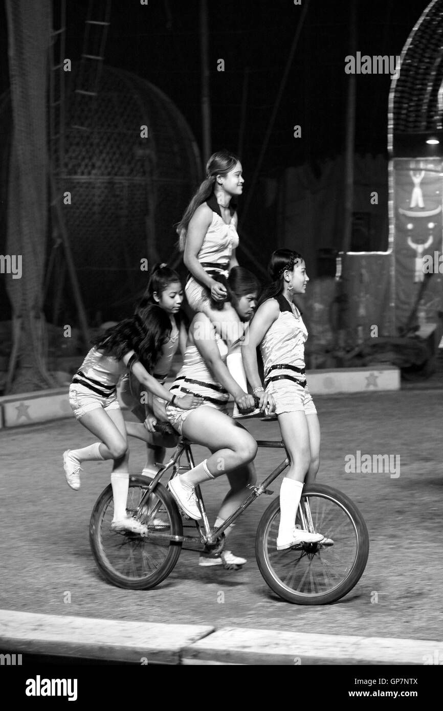 Cycling in circus, india, asia Stock Photo