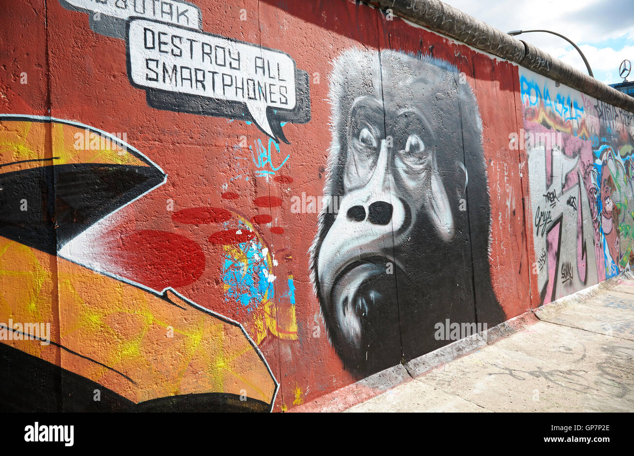 Destroy all smartphones painting on the Berlin Wall at the East Side Gallery, Germany. Stock Photo