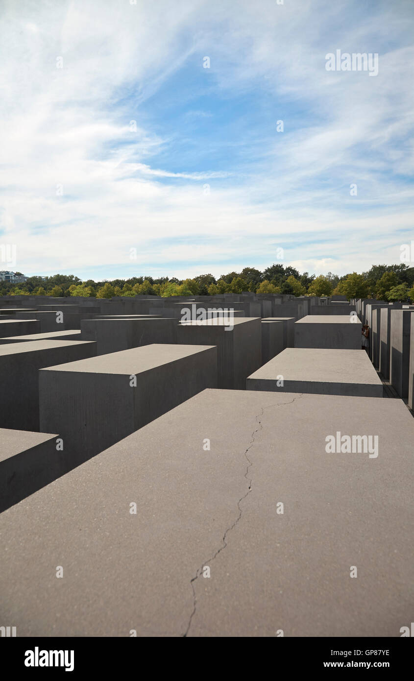 Memorial to the murdered Jews of Europe with blue and white cloud sky Stock Photo