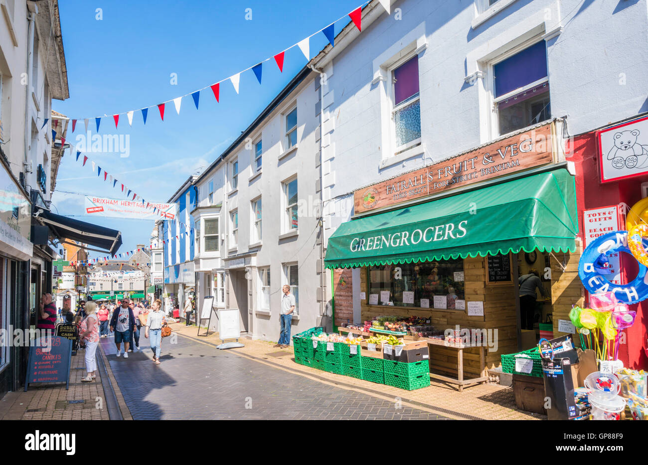 Shops on Fore Street Brixham Devon England UK GB EU Europe Stock Photo