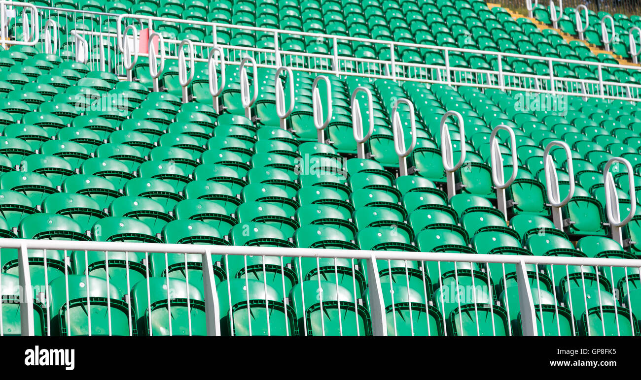 Green seats on outdoor stadium Stock Photo Alamy