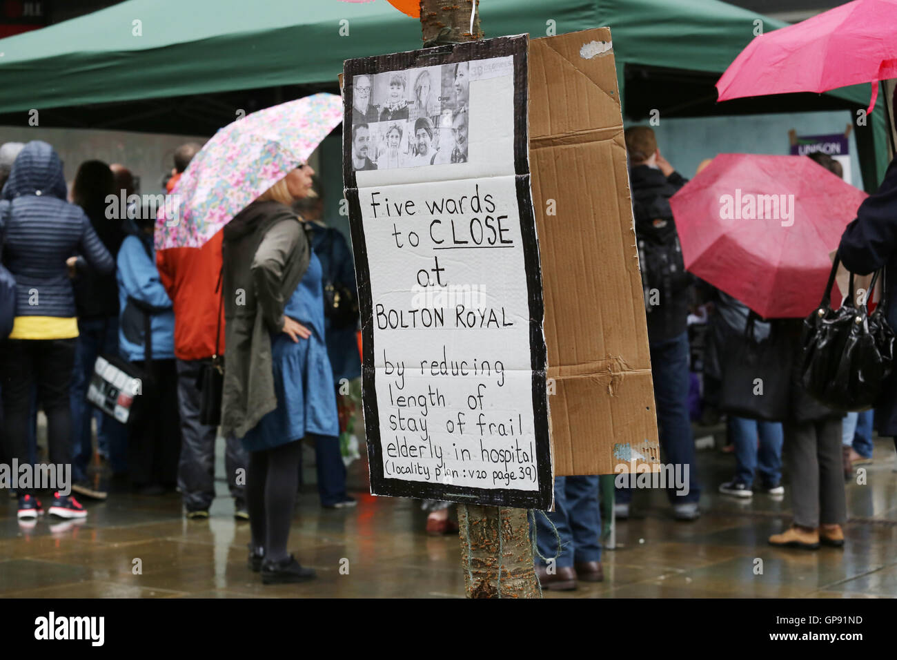 Bolton, Lancashire, UK. 3rd September, 2016. Save Our NHS Rally takes place in Bolton. A placard which reads 'Five wards to close at Bolton Royal by reducing length of stay of frail elderly in hospital',  Bolton, 3rd September, 2016 Credit:  Barbara Cook/Alamy Live News Stock Photo