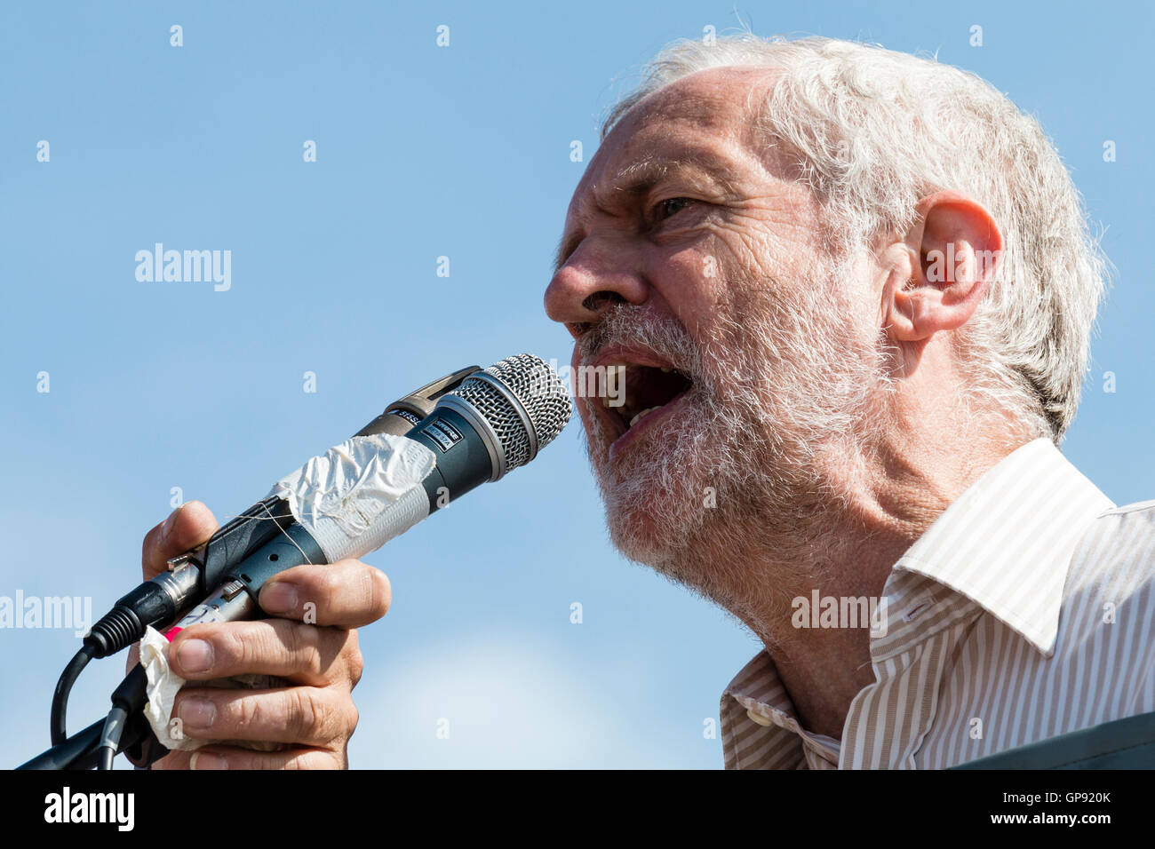 Jeremy Corbyn, UK opposition leader and head of the labour party, addressing a rally at Ramsgate. Low angle view close up of face as he speaks into a microphone. Stock Photo