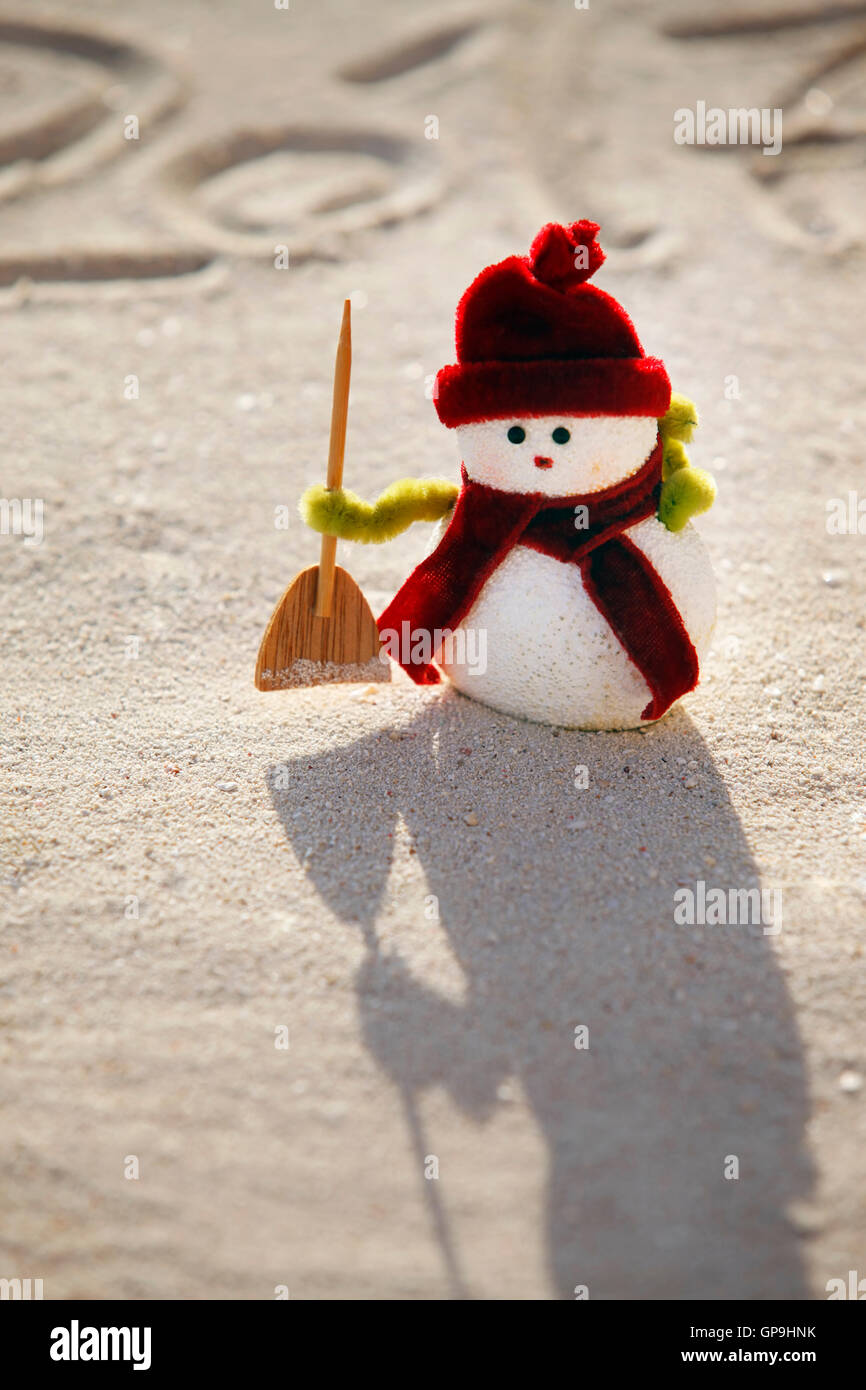 Toy snowman on the sand and figures 2017 Stock Photo Alamy