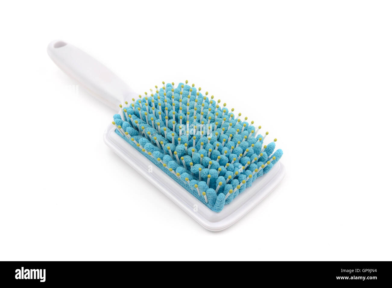 Modern hair comb with embed micro fiber for faster drying hair. Massage scalp when brush hair. Stock Photo
