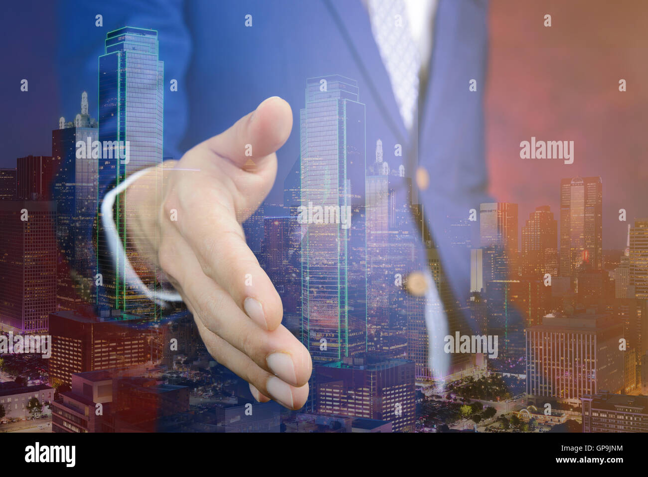 businessman in blue suit reaching hand to shake hands, make a business deal concept Stock Photo