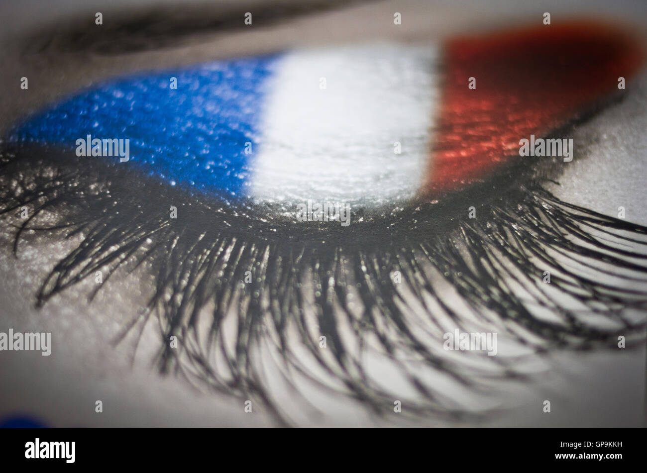 Tricolore makeup on a film programme at the Kino International during  French Film Week in Berlin, Germany Stock Photo - Alamy