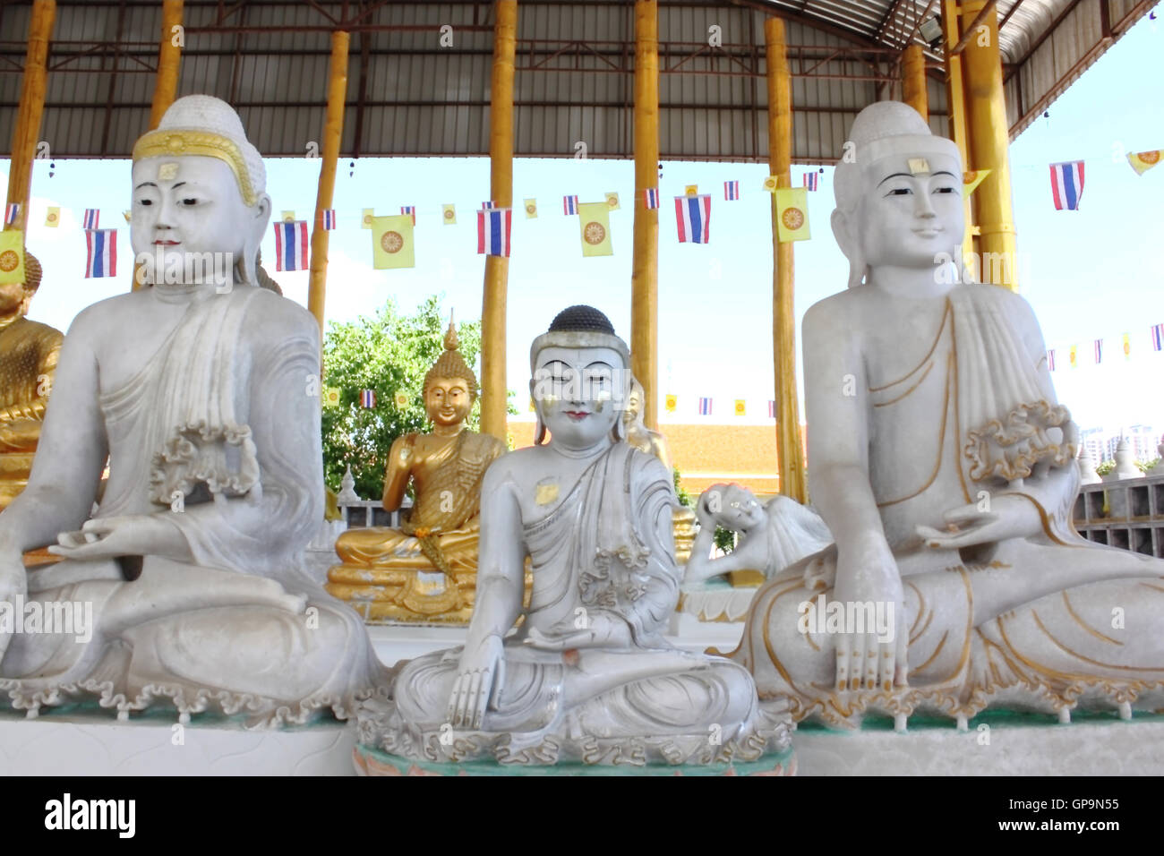 The marble Buddha statue in thailand Stock Photo - Alamy