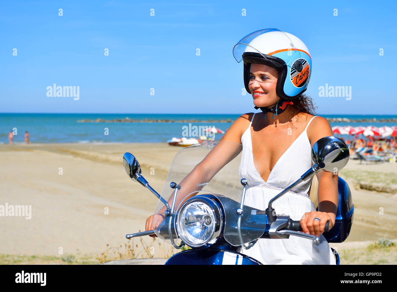 Woman, Girl, drive, helmet, Scooter, Motorbike, Vespa, Primavera, Beach,  Senigallia, Province Ancona, Marken, Italy, Europe Stock Photo - Alamy