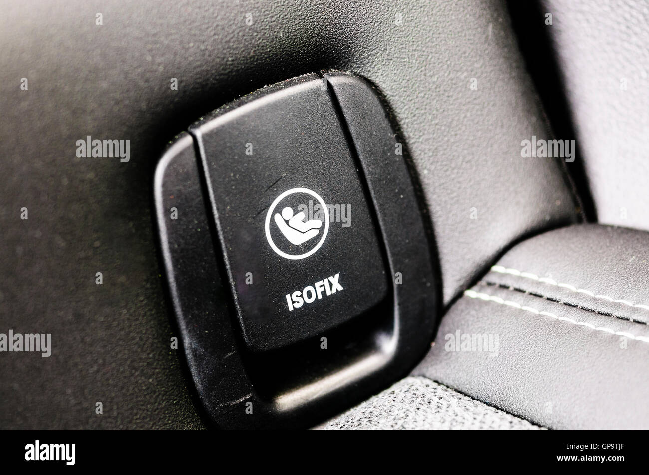 ISOFIX anchor point on the rear seat of a car Stock Photo
