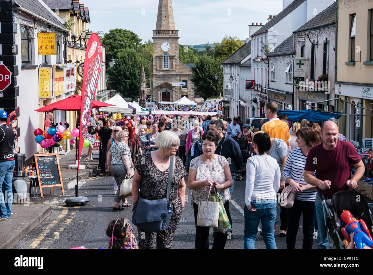 Crowds fill the streets of Ballycastle, during the annual Auld Lammas Fair, the oldest fair in the world. Stock Photo