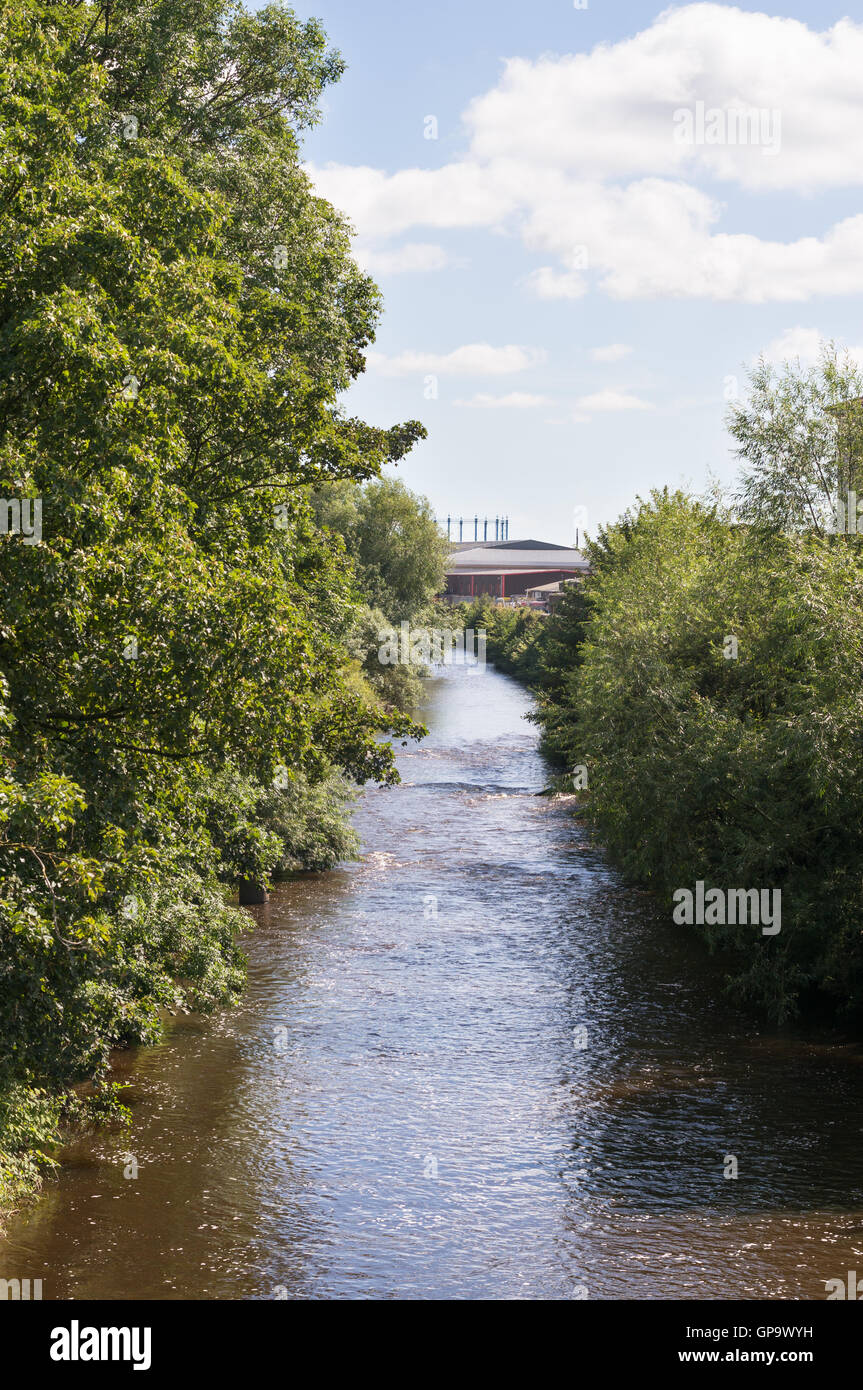 The River Caldew passing through Carlisle city centre Cumbria, England, UK Stock Photo
