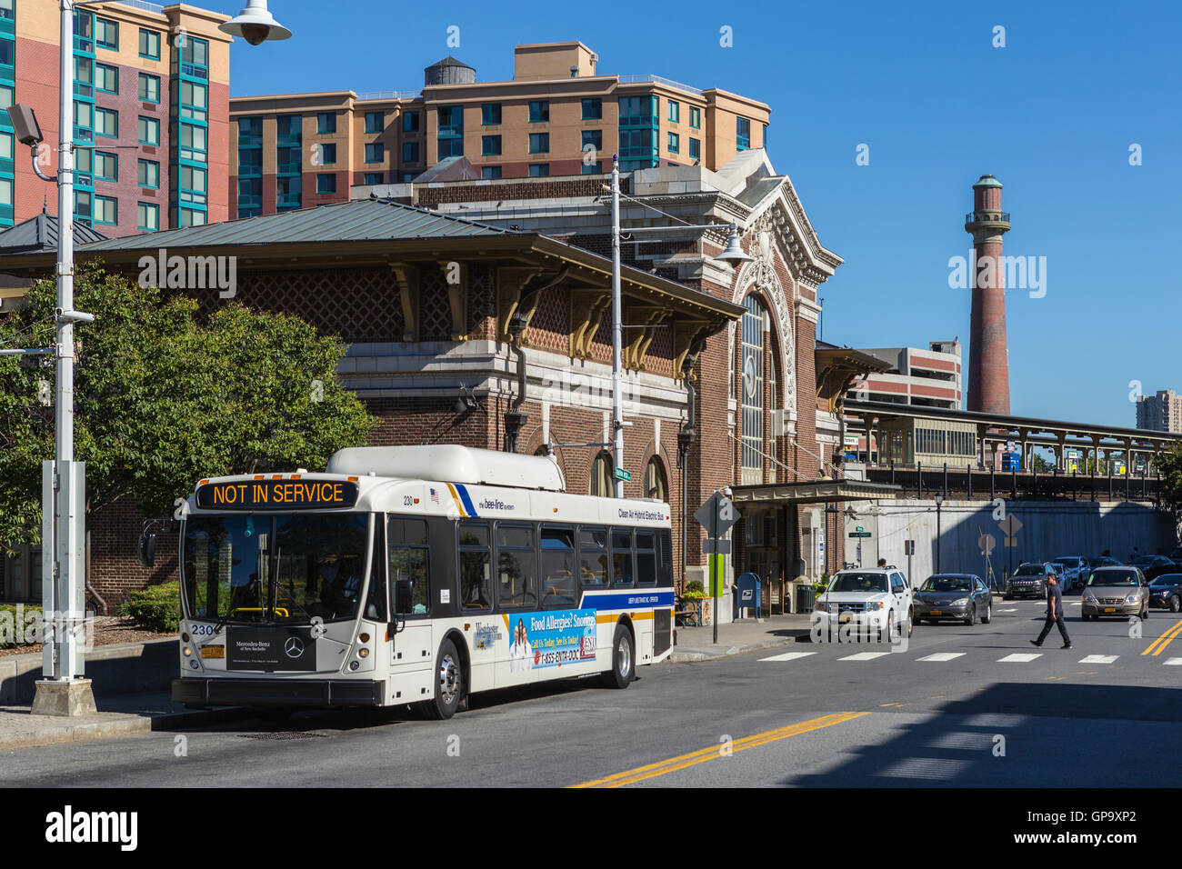 A Westchester County Bee-line System parked and waiting for its next assignment outside the train station in Yonkers, New York. Stock Photo