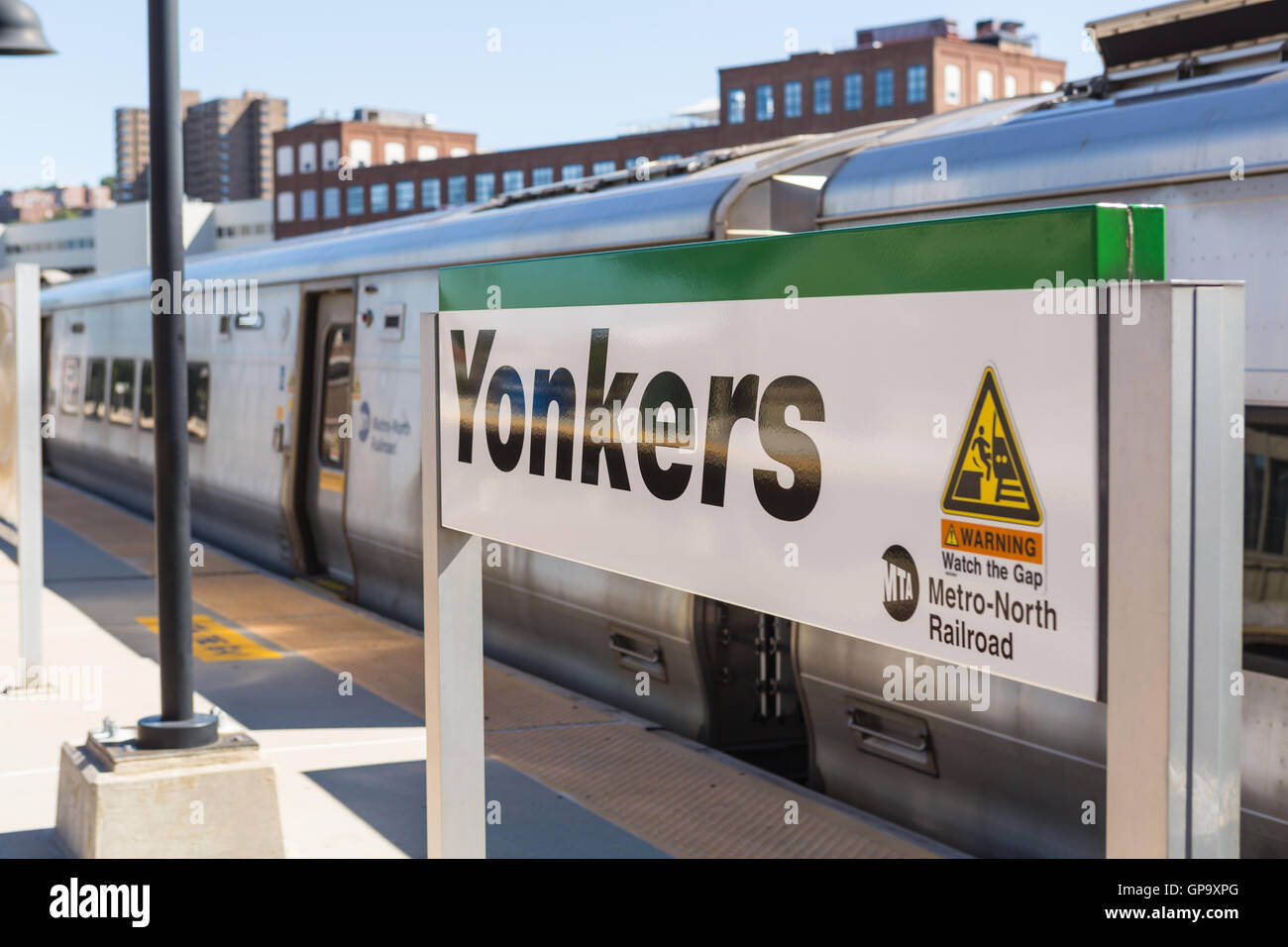 A Metro-North Hudson Line train waits to depart the station in Yonkers, New York. Stock Photo