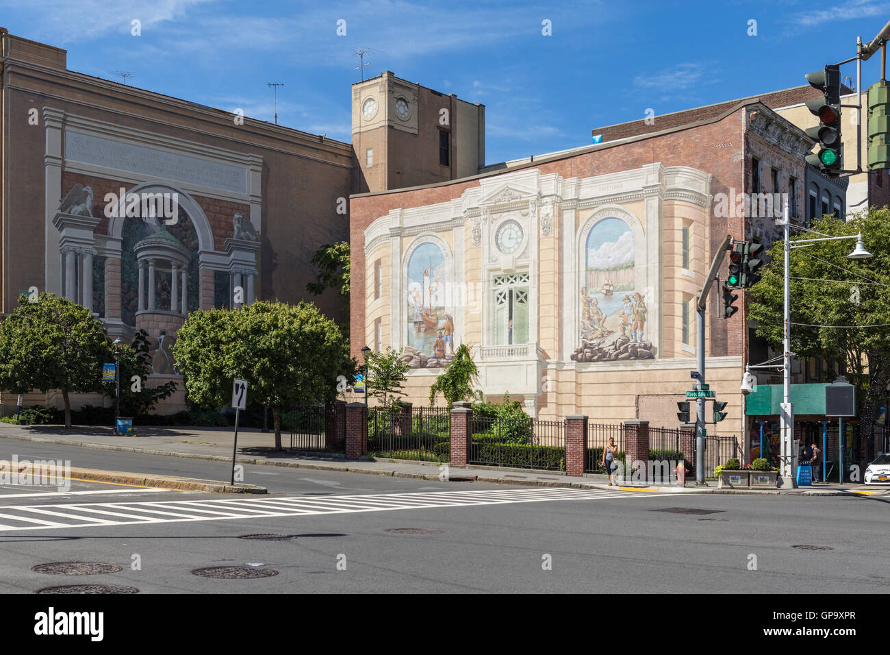 Two of the 'Gateway to Waterfront' murals on building walls in the Richard Haas Mural Historic District in Yonkers, New York. Stock Photo