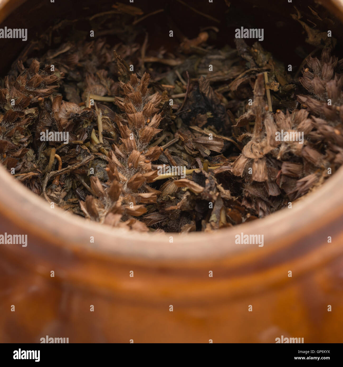medicinal herbs has been decocted with enamel pot close up Stock Photo