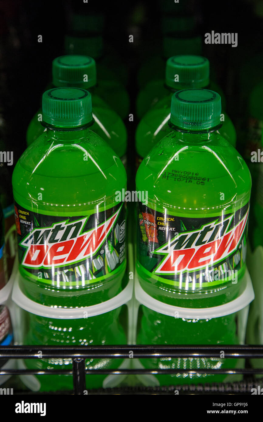 Mountain Dew soda plastic bottles on display in the refrigerator case of a store Stock Photo
