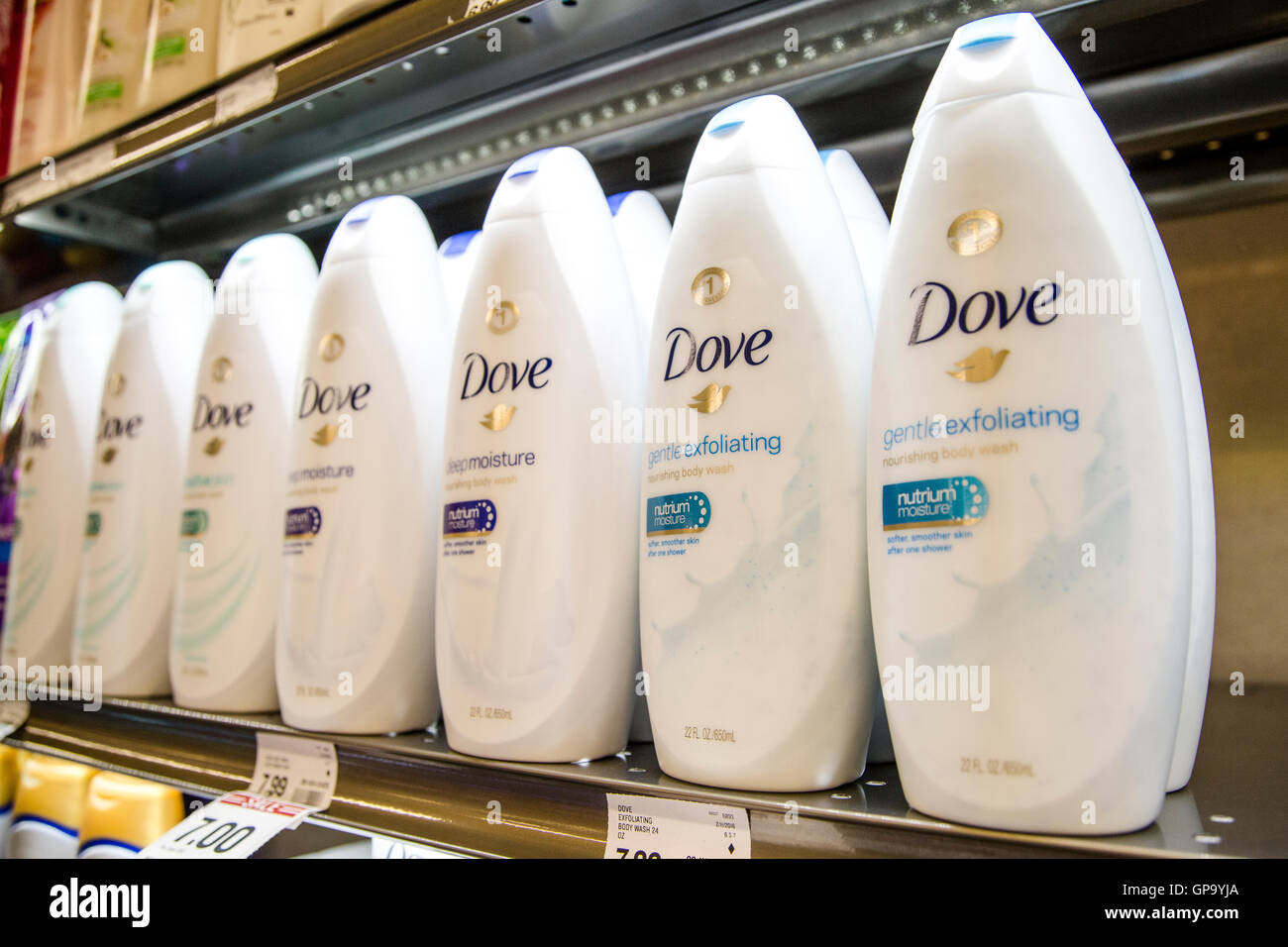 Shelves of Dove body wash and soap on display at a drugstore Stock Photo