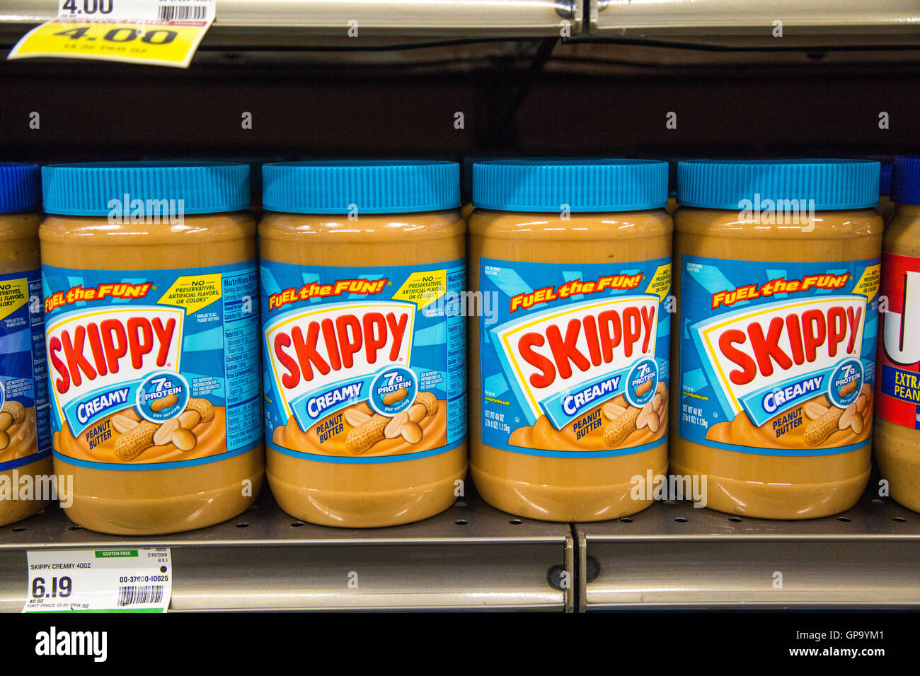 Jars of Skippy peanut butter on the shelf of a grocery store Stock Photo