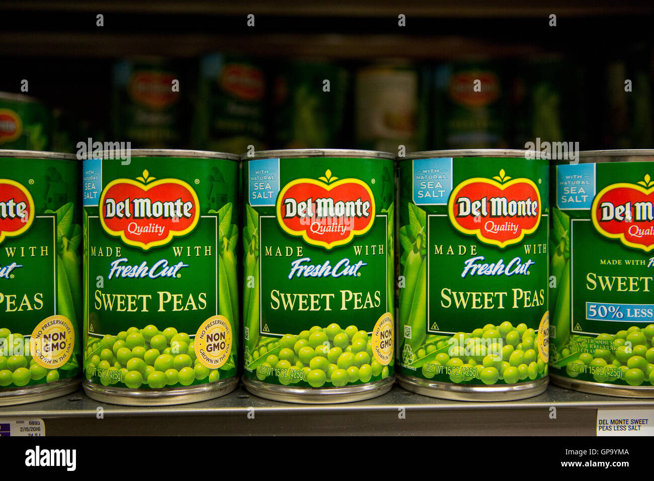 Rows of canned food on a grocery store shelf Stock Photo Alamy