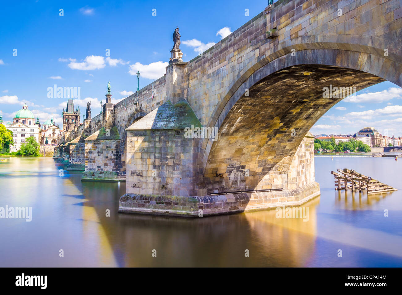 The Charles bridge is located in Prague, Czech Republic. Finished in the XV century, it is a medieval gothic bridge crossing the Stock Photo