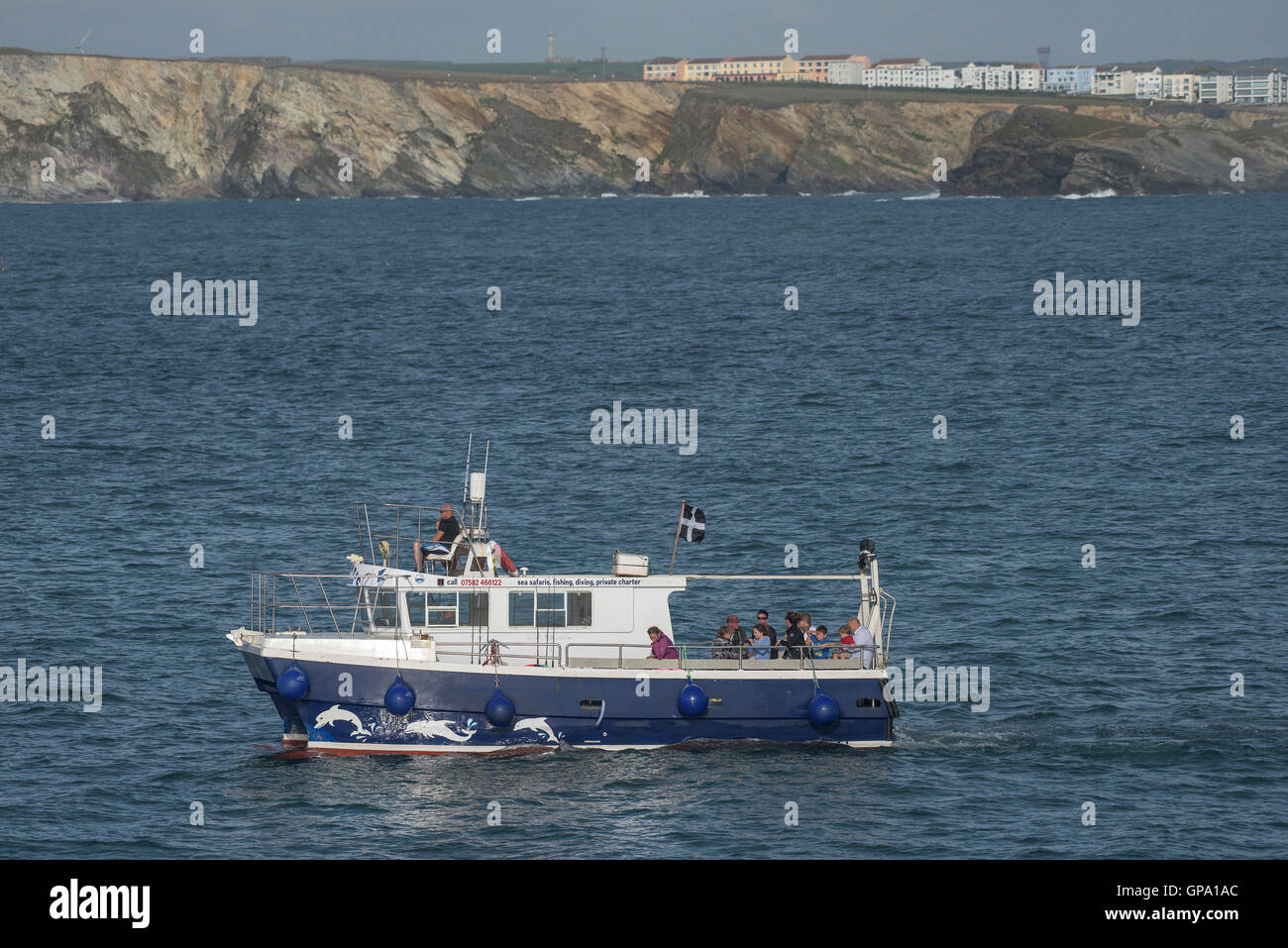 The Atlantic Explorer steams along the coast of Newquay. Stock Photo