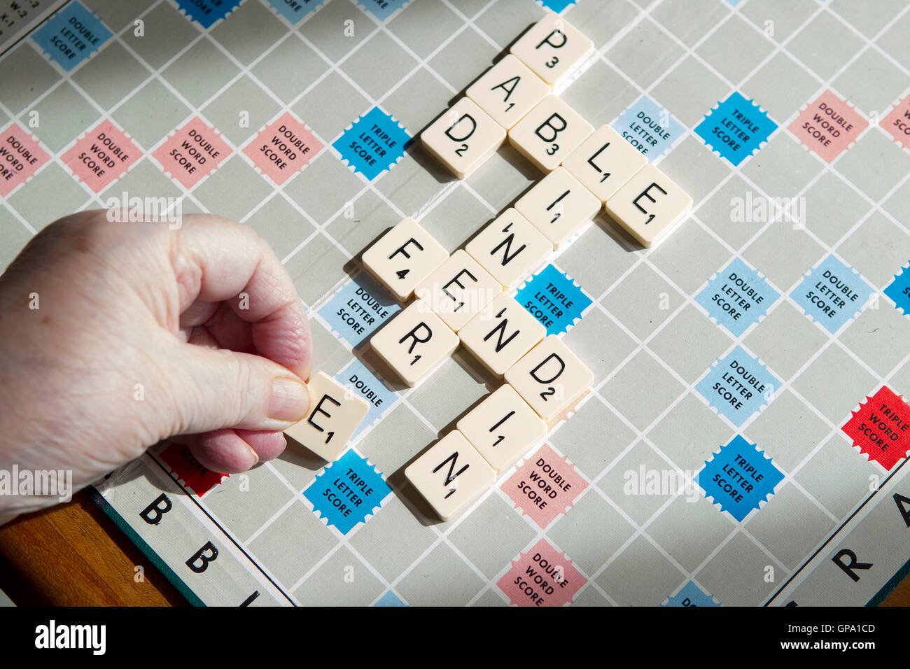 Elderly people keeping mentally active Stock Photo