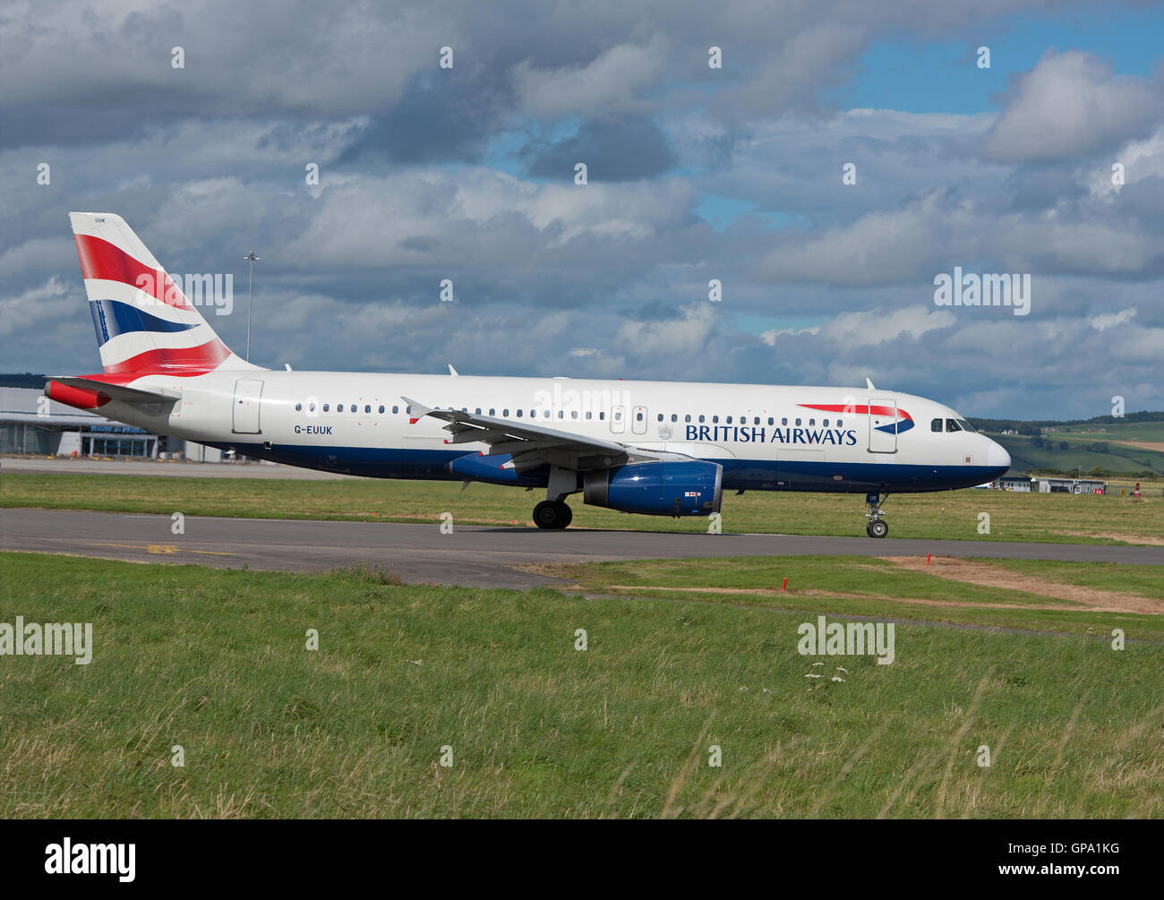 British Airways Airbus A320-232on runway at Inverness Airfield about to take off.  SCO11,222. Stock Photo
