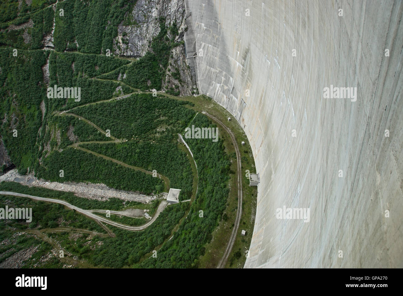 The Kölnbrein Dam is an arch dam in the Hohe Tauern range within Carinthia, Austria. Stock Photo