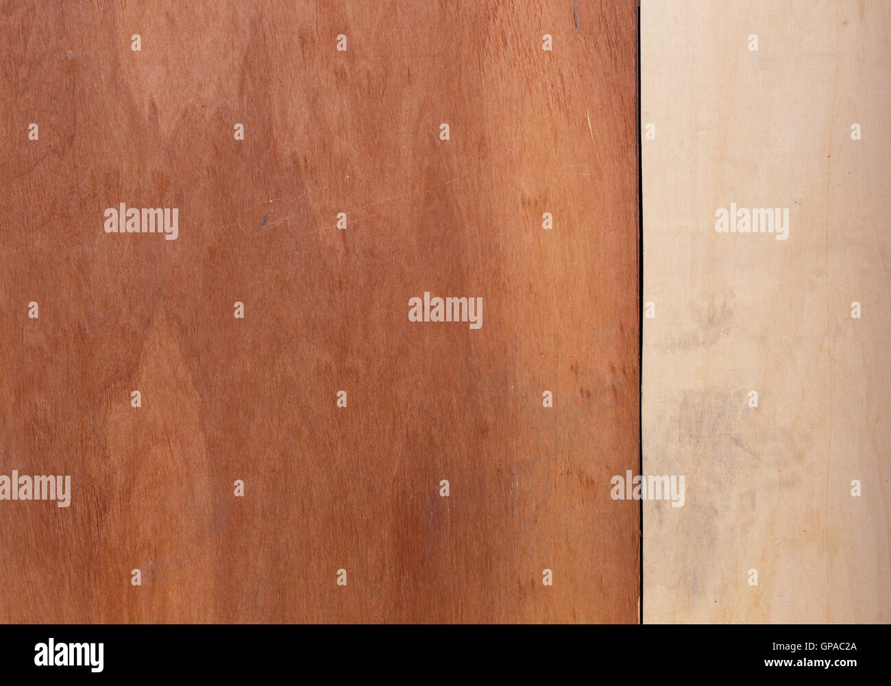 Board up windows with wooden plates decorative woodgrain veneer natural background Stock Photo
