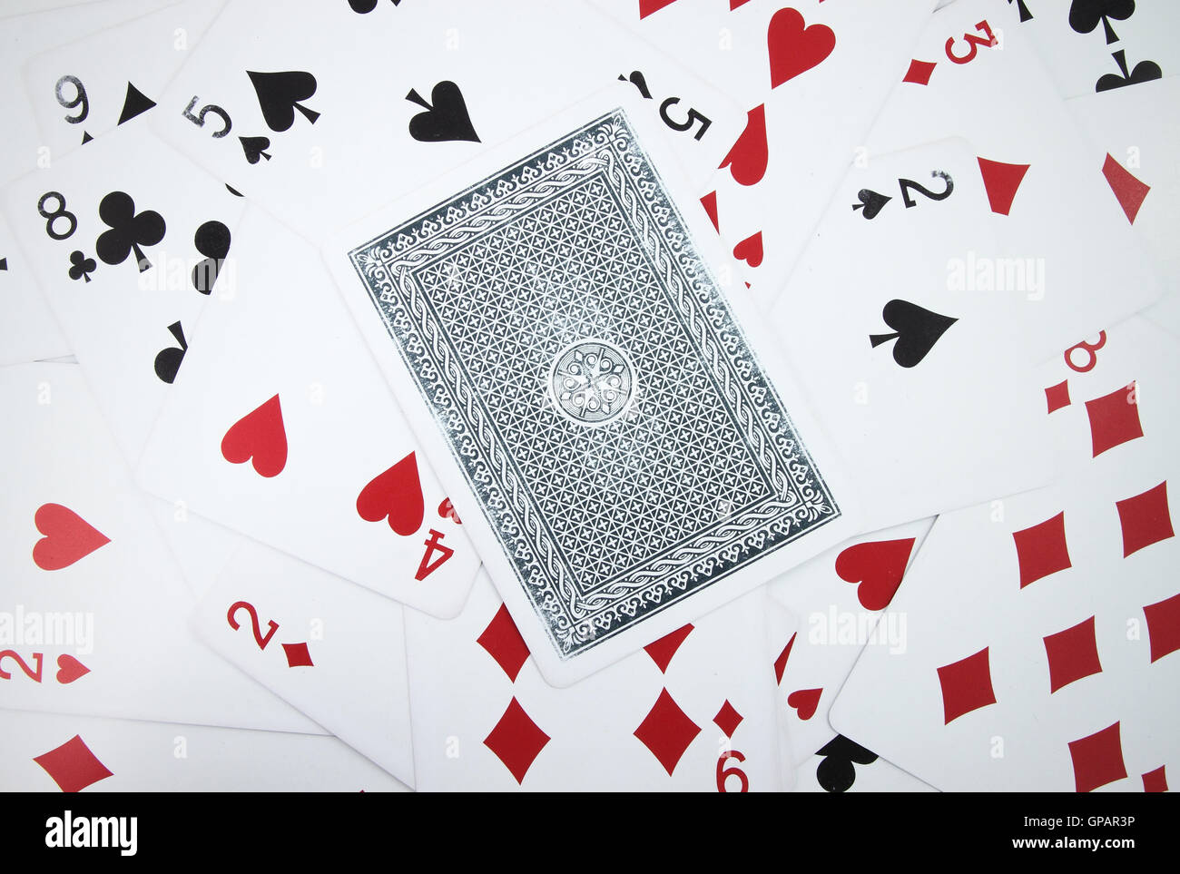 Card with playing cards background Stock Photo Alamy