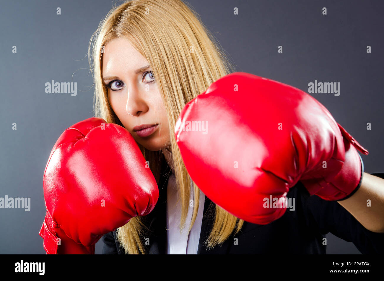 Woman boxer in dark room Stock Photo Alamy