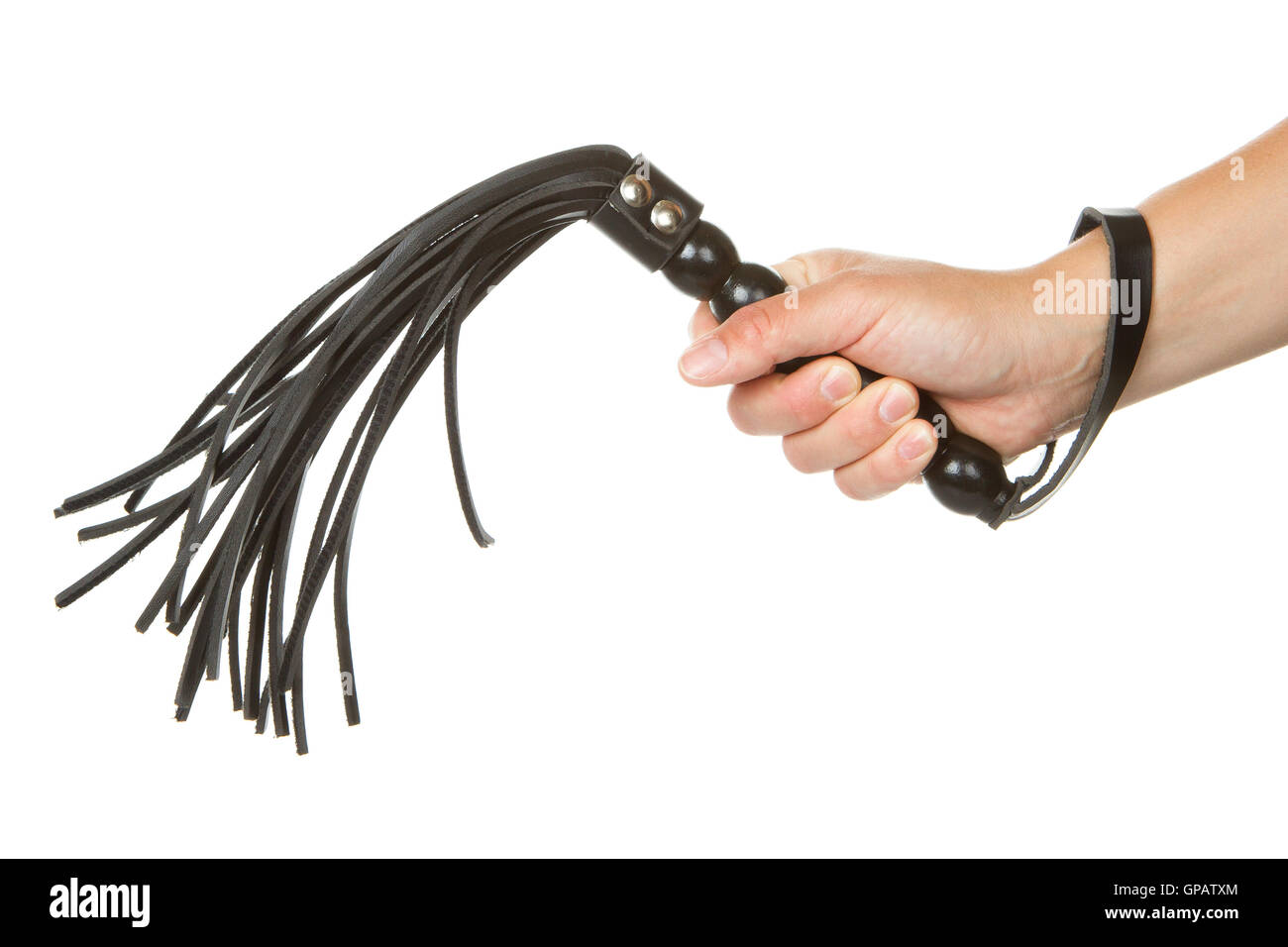 Flogging Strict Black Leather Flogging Whip in woman's hand Stock Photo - Alamy