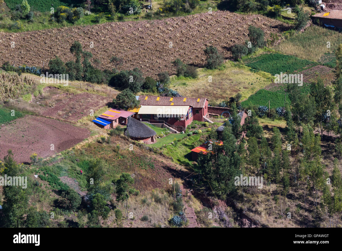 Cusco, Peru - May 15: Small farmhouses views from a distance in the Sacred Valley of the incas, a lifestyle photograph. May 15 2 Stock Photo