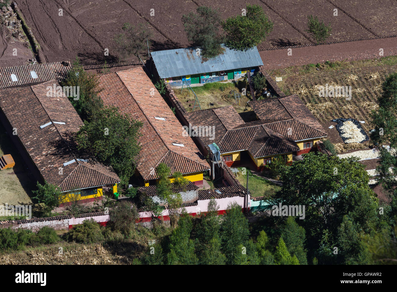 Cusco, Peru - May 15: Small farmhouses views from a distance in the Sacred Valley of the incas, a lifestyle photograph. May 15 2 Stock Photo