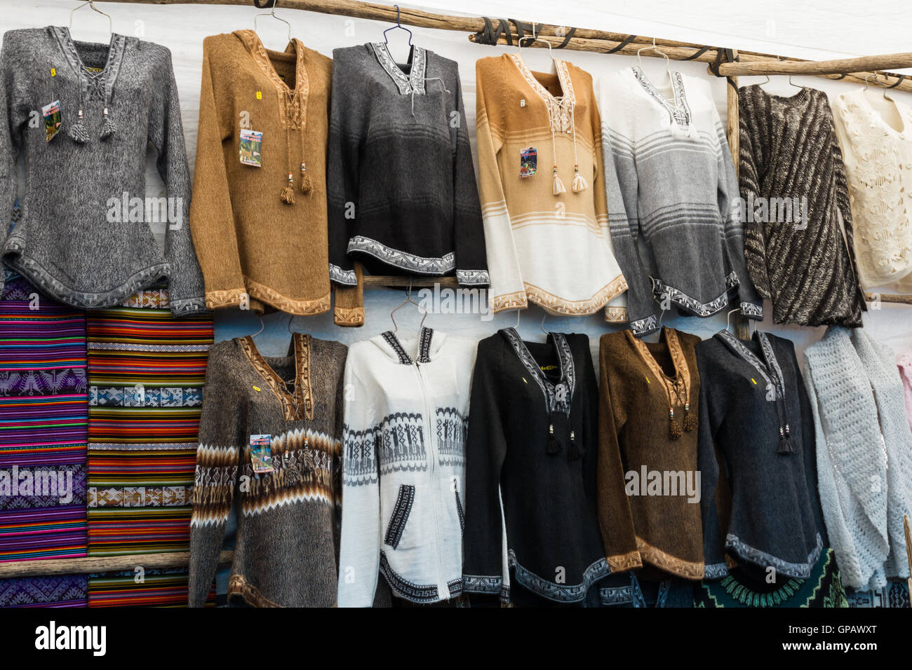Pisac Peru May 15 Beautiful sweaters made with alpaca and llama hair for sale in the Pisac market. May 15 2016 Pisac Peru Stock Photo Alamy