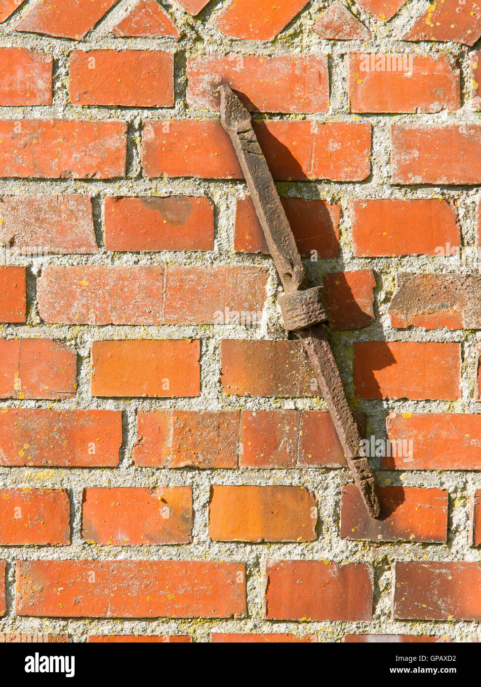 Old rusty clamp in a brick wall Stock Photo Alamy