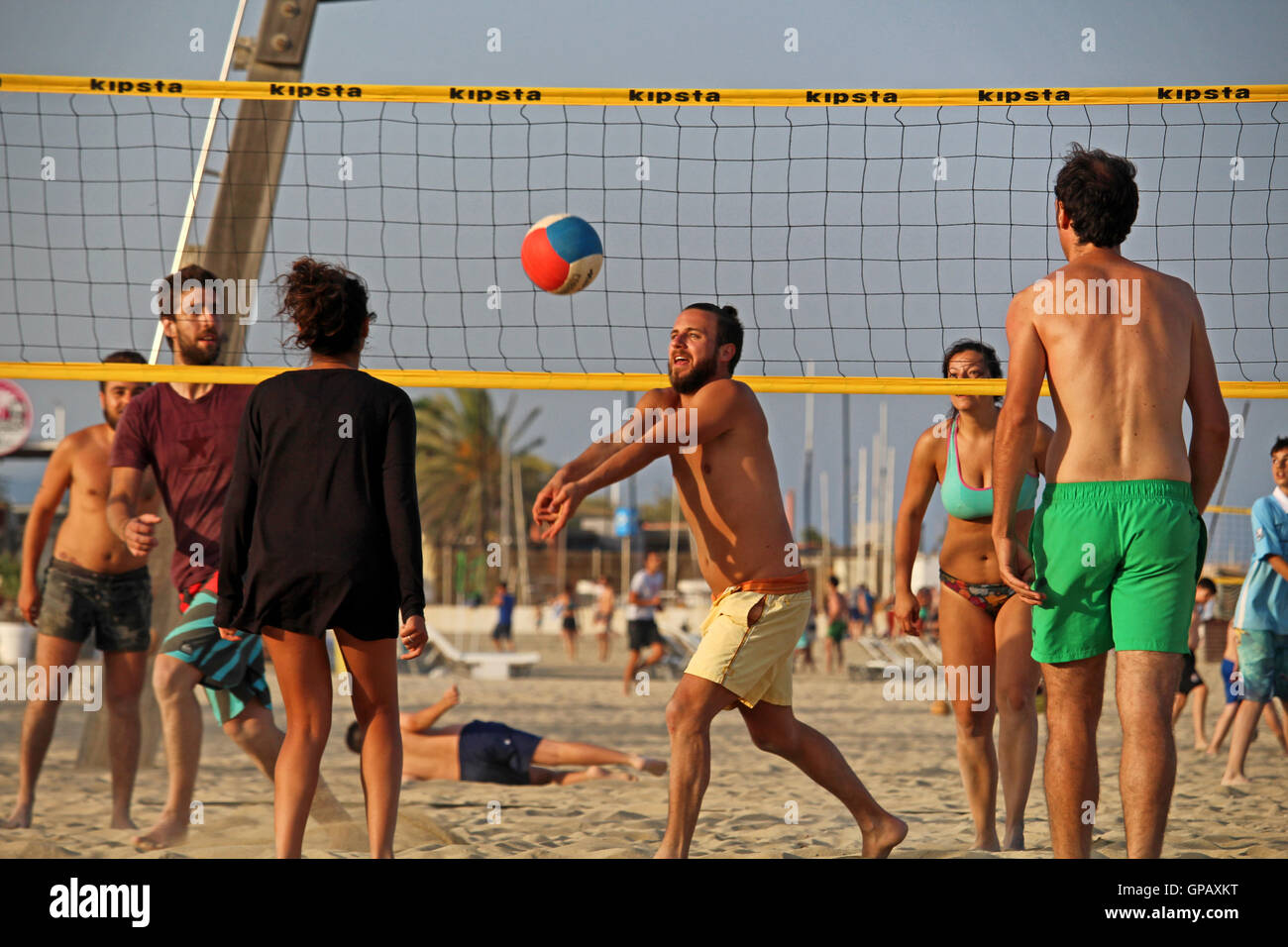 Beach volleyball beach barcelona spain hires stock