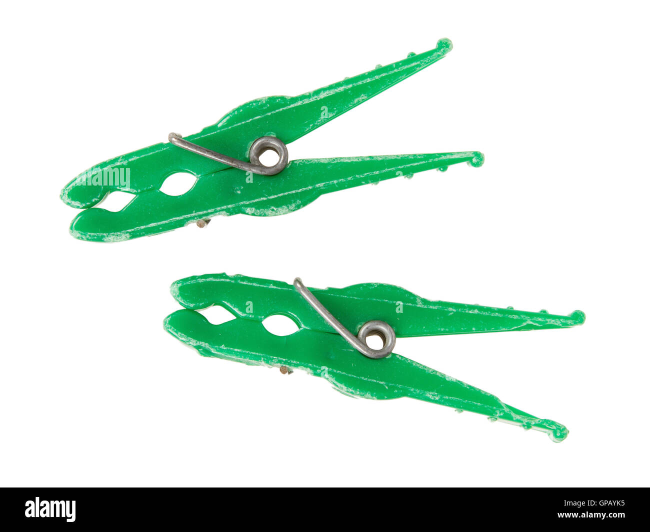 Two old green clothespins Stock Photo Alamy