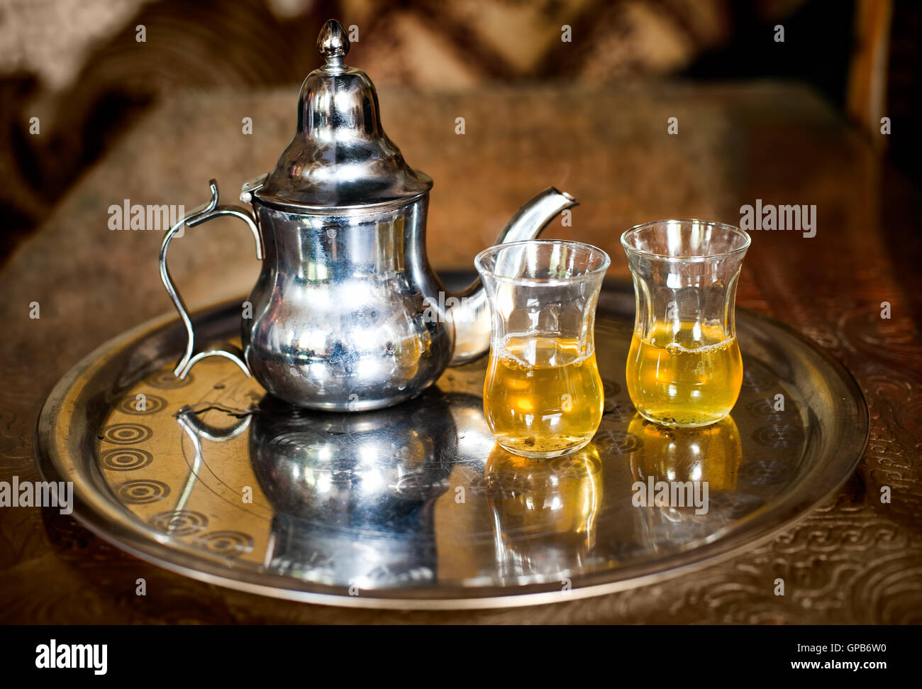 Set of arabic nana mint tea with metal tea pot and glasses Stock Photo
