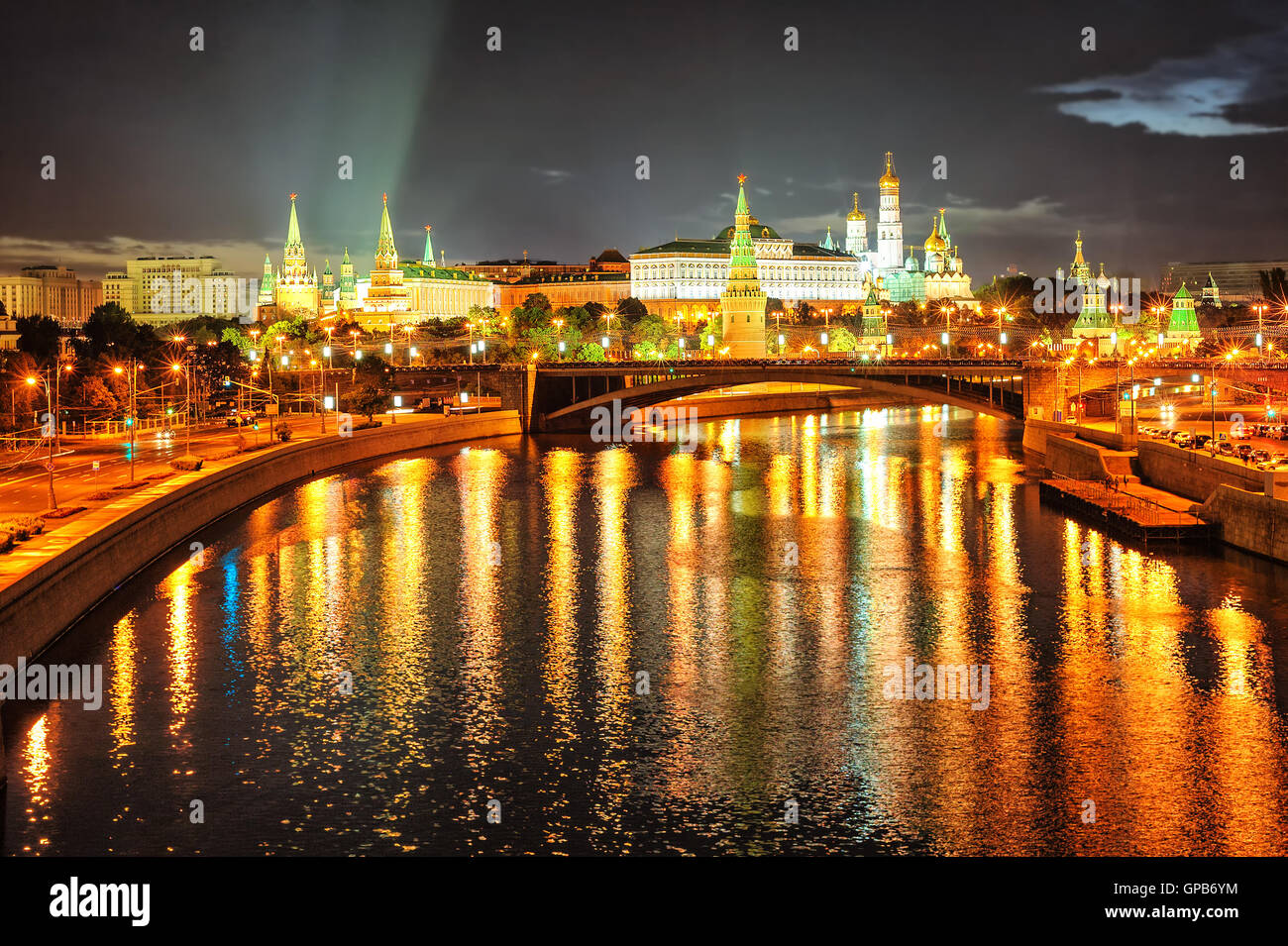 Moscow Kremlin reflecting in the Moskva River at night, Russian Federation Stock Photo