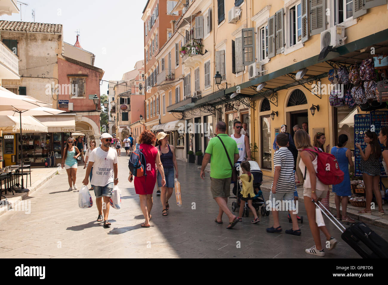 Holidaymakers sightseeing and shopping in Corfu town, Corfu, Greece Stock Photo Alamy