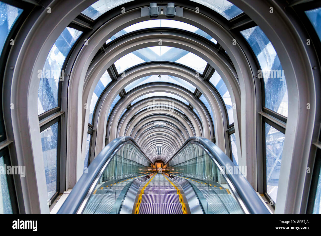 Osaka, Japan - April 29, 2014: View of the spectacular escalator in Umeda Sky Building, a modern high rise skyscraper. Stock Photo