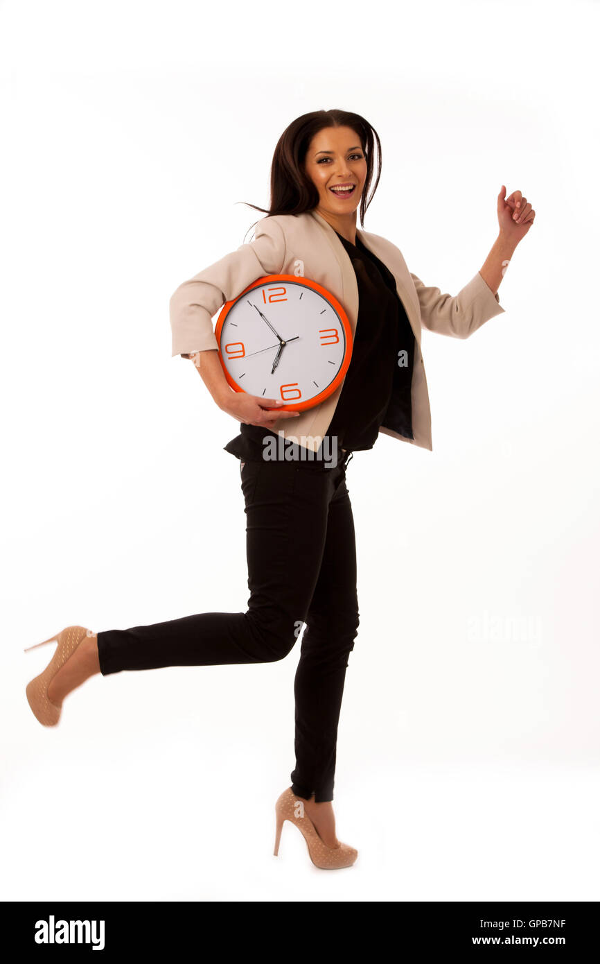 Late Or Rushing Stressed woman with big clock rushing because of being late Stock Photo ...
