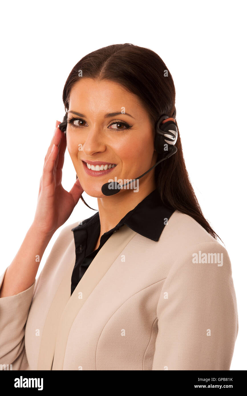 Woman with headset and microphone working in call center for helping customers. Stock Photo
