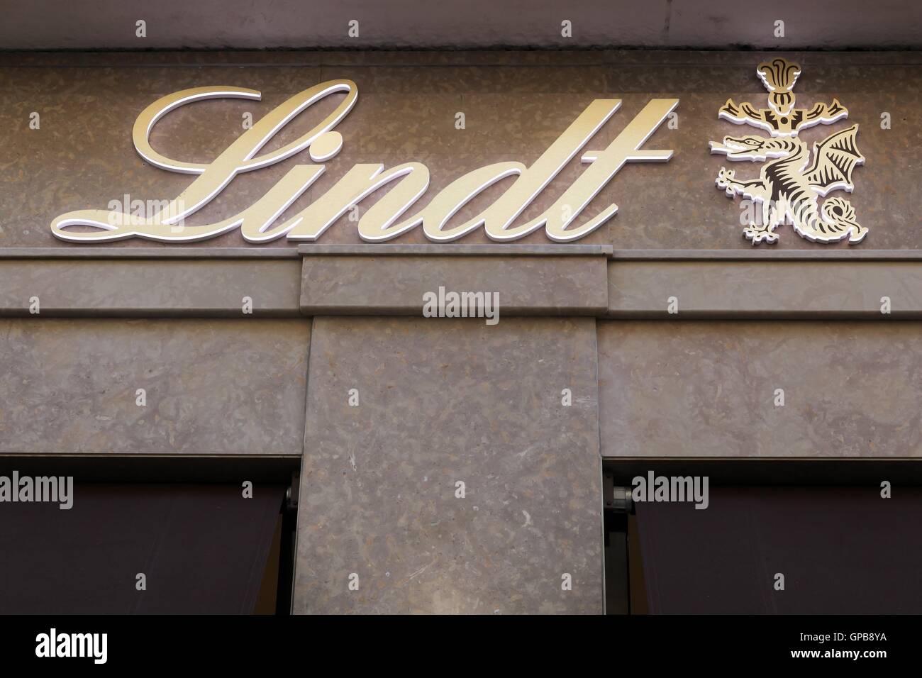 Lindt logo on a wall. Lindt is a Swiss chocolatier and confectionery company Stock Photo