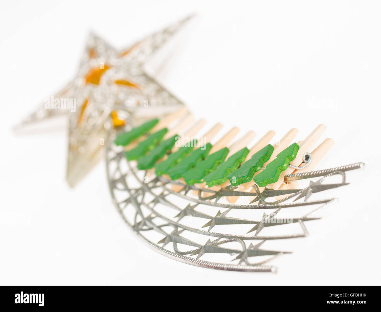 Falling star, christmas decoration with small clothing pins isol Stock ...